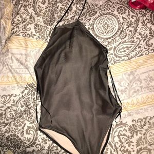 Mesh bodysuit with tan lining in inside